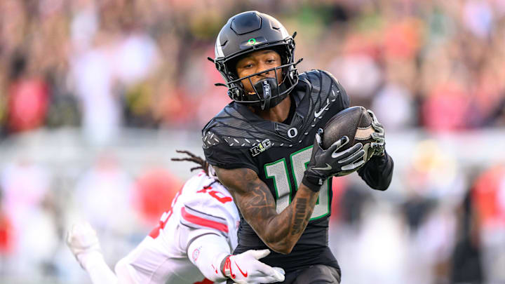 Oct 12, 2024; Eugene, Oregon, USA; Oregon Ducks wide receiver Tez Johnson (15) makes a catch for a touchdown during the second quarter against the Ohio State Buckeyes at Autzen Stadium. Mandatory Credit: Craig Strobeck-Imagn Images