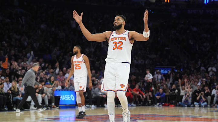 Feb 20, 2025; New York, New York, USA; New York Knicks center Karl-Anthony Towns (32) reacts to a play against the Chicago Bulls during the overtime at Madison Square Garden. Mandatory Credit: Gregory Fisher-Imagn Images