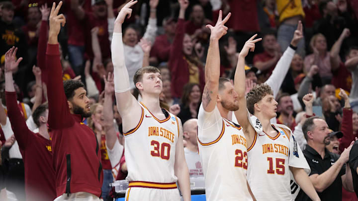 Mar 21, 2025; Milwaukee, WI, USA; Iowa State Cyclones center JT Rock (30), forward Conrad Hawley (23), guard Nojus Indrusaitis (15) and teammates celebrate during the second half of a first round NCAA men’s tournament game against the Lipscomb Bisons at Fiserv Forum. Mandatory Credit: Jeff Hanisch-Imagn Images