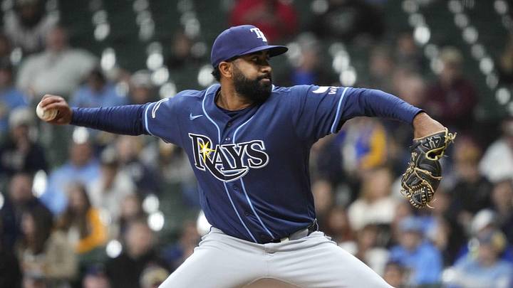 Mar 31, 2026; Milwaukee, Wisconsin, USA; Tampa Bay Rays pitcher Yoendrys Gomez (94) delivers a pitch against the Milwaukee Brewers in the seventh inning against the Milwaukee Brewers at American Family Field. Mandatory Credit: Michael McLoone-Imagn Images