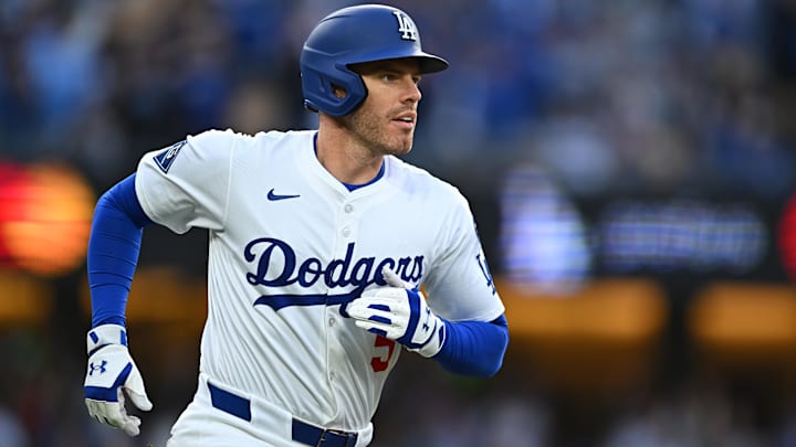 Mar 29, 2025; Los Angeles, California, USA; Los Angeles Dodgers first baseman Freddie Freeman (5) hits a home run during the 1st inning against the Detroit Tigers at Dodger Stadium. Mandatory Credit: Jonathan Hui-Imagn Images Mar 29, 2025; Los Angeles, California, USA; Los Angeles Dodgers first baseman Freddie Freeman (5) hits a home run during the 1st inning against the Detroit Tigers at Dodger Stadium. Mandatory Credit: Jonathan Hui-Imagn Images