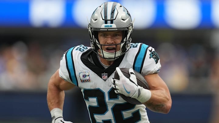 Oct 16, 2022; Inglewood, California, USA; Carolina Panthers running back Christian McCaffrey (22) carries the ball against the Los Angeles Rams in the first half at SoFi Stadium. Mandatory Credit: Kirby Lee-Imagn Images Oct 16, 2022; Inglewood, California, USA; Carolina Panthers running back Christian McCaffrey (22) carries the ball against the Los Angeles Rams in the first half at SoFi Stadium. Mandatory Credit: Kirby Lee-Imagn Images