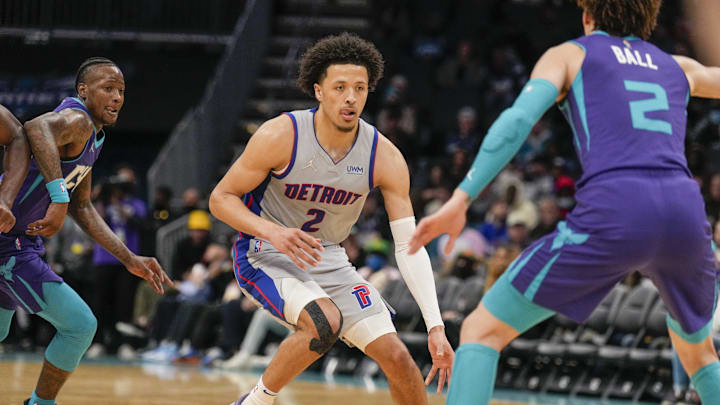 Feb 27, 2022; Charlotte, North Carolina, USA; Detroit Pistons guard Cade Cunningham (2) dribbles against Charlotte Hornets guard LaMelo Ball (2): Jim Dedmon-Imagn Imagesthe