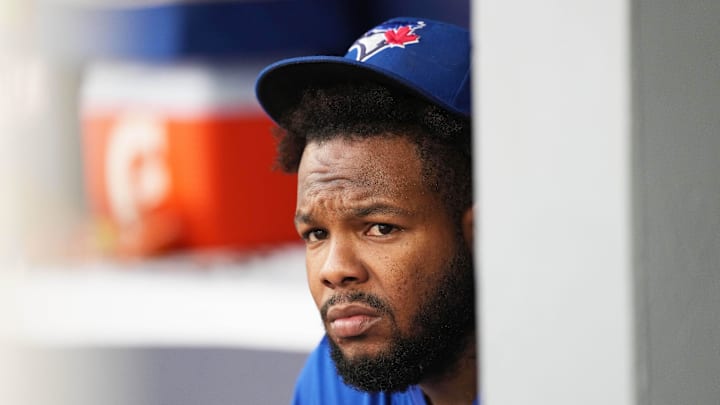 Sep 29, 2024; Toronto, Ontario, CAN; Toronto Blue Jays designated hitter Vladimir Guerrero Jr. (27) sits in the dugout before the start of a game against the Miami Marlins at Rogers Centre. Mandatory Credit: Nick Turchiaro-Imagn Images