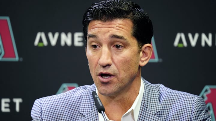 Arizona Diamondbacks GM Mike Hazen introduces new starting pitcher Eduardo Rodriguez during a news conference at Chase Field on Dec. 12, 2023.