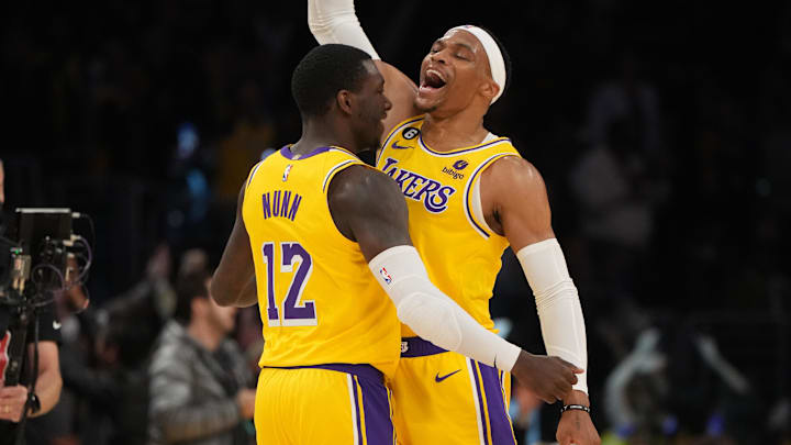 Nov 30, 2022; Los Angeles, California, USA; Los Angeles Lakers guard Russell Westbrook (0) and guard Kendrick Nunn (12) celebrate against the Portland Trail Blazers in the second half at Crypto.com Arena. Mandatory Credit: Kirby Lee-Imagn Images
