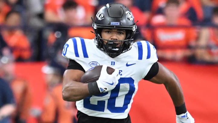 Sep 27, 2025; Syracuse, New York, USA; Duke Blue Devils running back Nate Sheppard (20) carries the ball in the second quarter against the Syracuse Orange at the JMA Wireless Dome. Mandatory Credit: Mark Konezny-Imagn Images