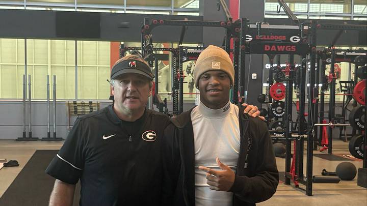 Casey "Super Man" Barner meets with Georgia coach Kirby Smart. Casey "Super Man" Barner meets with Georgia coach Kirby Smart.
