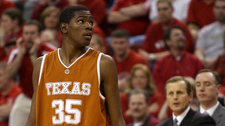 Jan 24, 2007; Lincoln, NE, USA;  Texas Longhorns forward Kevin Durant (35) looks to the clock with his head coach Rick Barnes in the background against the Nebraska Cornhuskers in the second half at the Bob Devaney Sports Center. Texas led at the half 31-28 and won 62-61. Mandatory Credit: Bruce Thorson-Imagn Images Copyright (c) 2007 Bruce Thorson