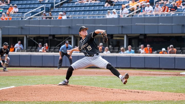 Troy Dressler delivers a pitch against the Virginia Cavaliers.