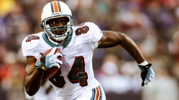 Chris Chambers (84) carries the ball against the Buffalo Bills at Ralph Wilson Stadium in a 2006 game.