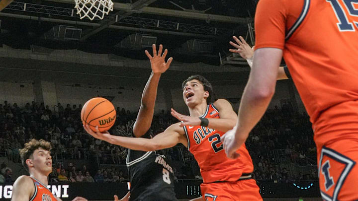 Illinois Fighting Illini guard Andrej Stojakovic (2) scores near VCU Rams forward Michael Belle (8) March 21, 2026 during the first half of the NCAA Men’s Basketball Tournament second round East Region game at the Bon Secours Wellness Arena in Greenville, South Carolina. Illinois Fighting Illini guard Andrej Stojakovic (2) scores near VCU Rams forward Michael Belle (8) March 21, 2026 during the first half of the NCAA Men’s Basketball Tournament second round East Region game at the Bon Secours Wellness Arena in Greenville, South Carolina.