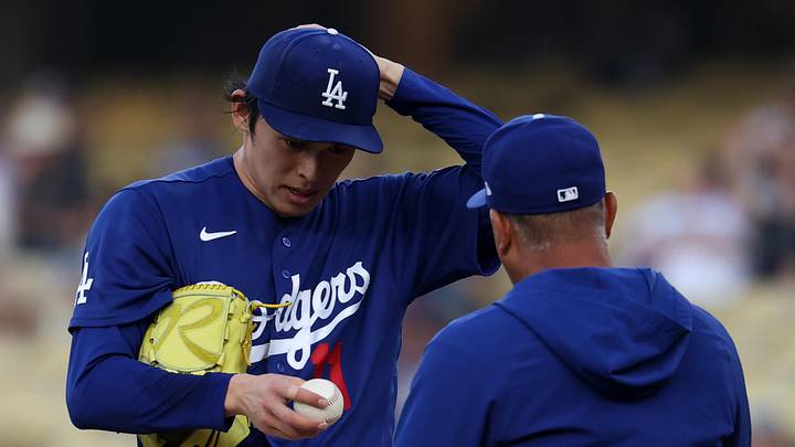 Mar 23, 2026; Los Angeles, California, USA; Los Angeles Dodgers pitcher Roki Sasaki (11) hands the ball to Los Angeles Dodgers manager Dave Roberts (right) as he is coming out from the game during the first inning against the Los Angeles Angels at Dodger Stadium. Mandatory Credit: Kiyoshi Mio-Imagn Images Mar 23, 2026; Los Angeles, California, USA; Los Angeles Dodgers pitcher Roki Sasaki (11) hands the ball to Los Angeles Dodgers manager Dave Roberts (right) as he is coming out from the game during the first inning against the Los Angeles Angels at Dodger Stadium. Mandatory Credit: Kiyoshi Mio-Imagn Images