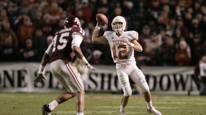 Nov 23, 2007; College Station, TX, USA; Texas Longhorns quarterback Colt McCoy (12) throws a pass against the Texas A&M Aggies in the fourth quarter at Kyle Field. Texas A&M beat Texas 38-30. Mandatory Credit: Brett Davis-Imagn Images