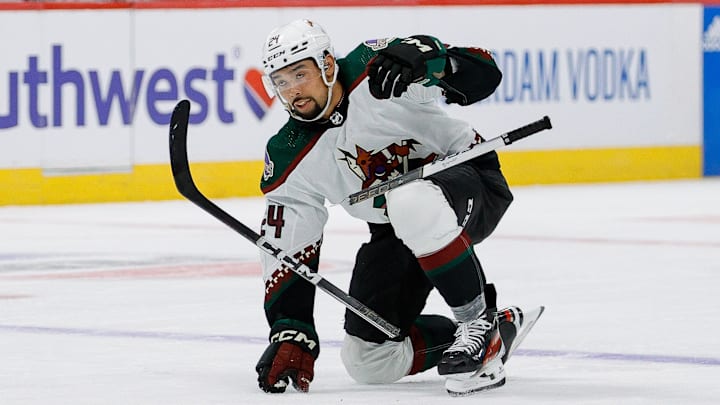 Feb 18, 2024; Denver, Colorado, USA; Arizona Coyotes defenseman Matt Dumba (24) breaks his stick on