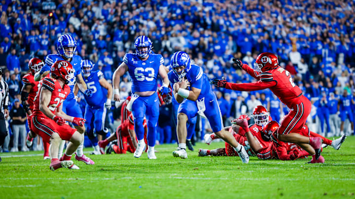 BYU quarterback Bear Bachmeier scores a touchdown against Utah