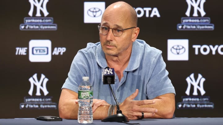 Aug 23, 2023; Bronx, New York, USA; New York Yankees general manager Brian Cashman talks with the media before the game between the Yankees and the Washington Nationals at Yankee Stadium. Mandatory Credit: Vincent Carchietta-USA TODAY Sports