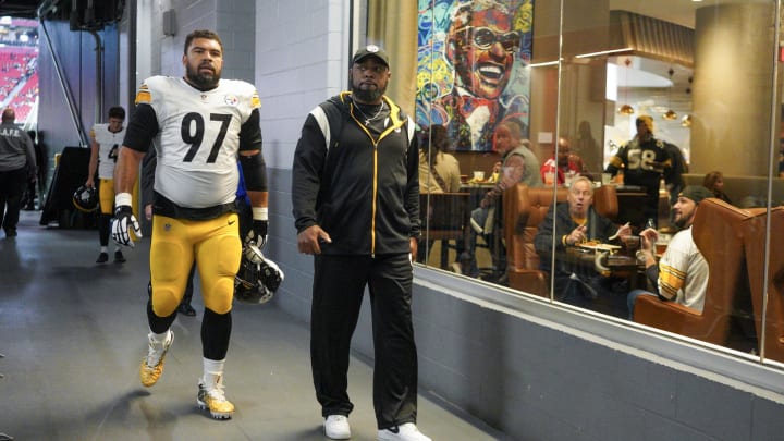 Dec 4, 2022; Atlanta, Georgia, USA; Pittsburgh Steelers defensive tackle Cameron Heyward (97) and head coach Mike Tomlin walk to the locker room before a game against the Atlanta Falcons at Mercedes-Benz Stadium. Mandatory Credit: Brett Davis-USA TODAY Sports