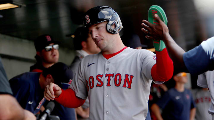 Sep 10, 2025; West Sacramento, California, USA; Boston Red Sox third baseman Alex Bregman (2) is congratulated by teammates after scoring a run against the Athletics during the third inning at Sutter Health Park.