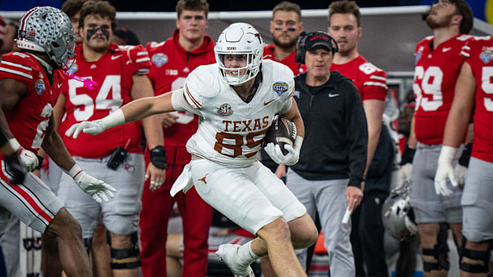 Texas Longhorns tight end Gunnar Helm (85) runs the ball down the sideline in the fourth quarter against Ohio State. Texas Longhorns tight end Gunnar Helm (85) runs the ball down the sideline in the fourth quarter against Ohio State.