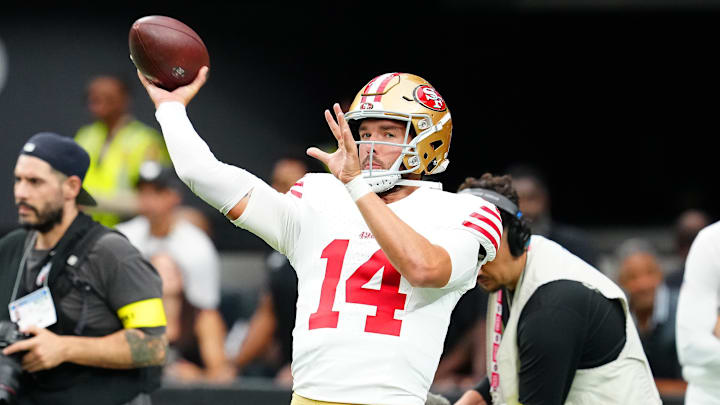 Aug 16, 2025; Paradise, Nevada, USA; San Francisco 49ers quarterback Carter Bradley (14) warms up before a preseason game against the Las Vegas Raiders at Allegiant Stadium. Mandatory Credit: Stephen R. Sylvanie-Imagn Images