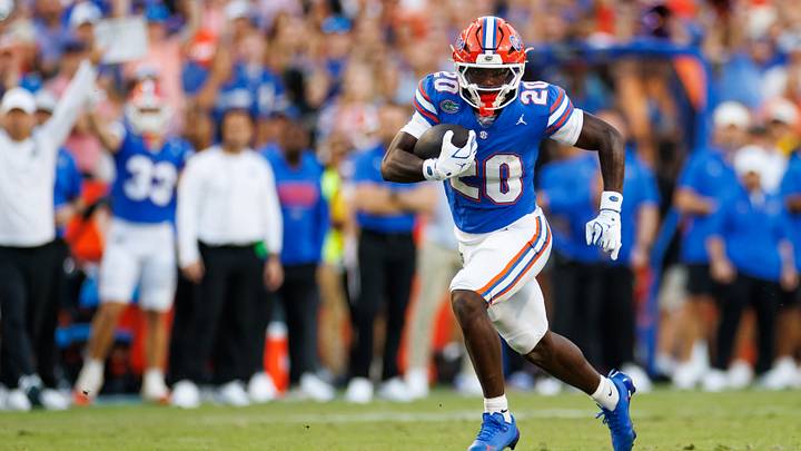 Sep 26, 2026; Gainesville, Florida, USA;  Florida Gators running back Duke Clark (20) rushes with the ball against the Mississippi Rebels during the second half at Ben Hill Griffin Stadium.  Mandatory Credit: Matt Pendleton-Imagn Images