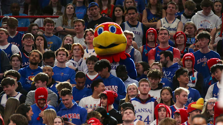 Jan 18, 2025; Lawrence, Kansas, USA; The Kansas Jayhawks mascot joins students in the stands to watch part of the second half against the Kansas State Wildcats at Allen Fieldhouse. Mandatory Credit: Scott Sewell-Imagn Images
