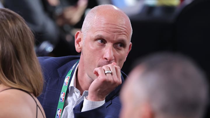 Jun 25, 2025; Brooklyn, NY, USA; Connecticut Huskies mens basketball head coach Dan Hurley looks on at the table of Liam McNeeley in the first round of the 2025 NBA Draft at Barclays Center. Mandatory Credit: Brad Penner-Imagn Images Jun 25, 2025; Brooklyn, NY, USA; Connecticut Huskies mens basketball head coach Dan Hurley looks on at the table of Liam McNeeley in the first round of the 2025 NBA Draft at Barclays Center. Mandatory Credit: Brad Penner-Imagn Images