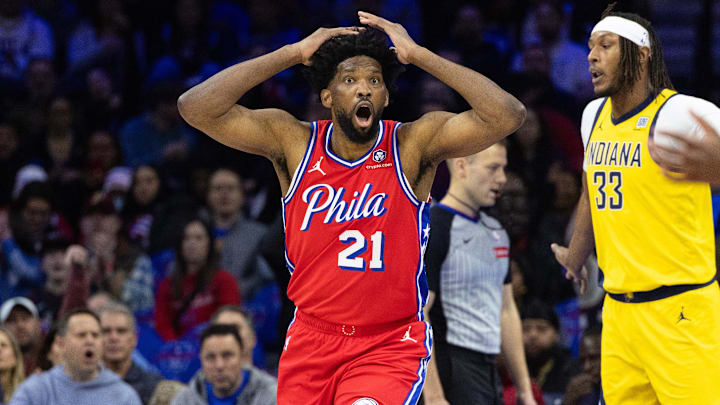 Dec 13, 2024; Philadelphia, Pennsylvania, USA; Philadelphia 76ers center Joel Embiid (21) reacts to a play against the Indiana Pacers during the first quarter at Wells Fargo Center. Mandatory Credit: Bill Streicher-Imagn Images