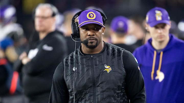 Jan 13, 2025; Glendale, AZ, USA; Minnesota Vikings defensive coordinator Brian Flores against the Los Angeles Rams during an NFC wild card game at State Farm Stadium. Mandatory Credit: Mark J. Rebilas-Imagn Images