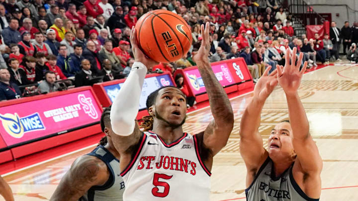 Butler v St. John's; St. John's basketball guard Deivon Smith rebounds against Butler