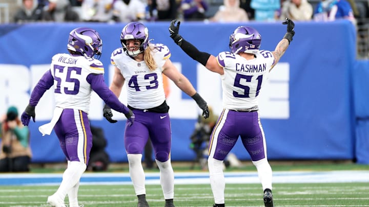 Dec 21, 2025; East Rutherford, New Jersey, USA; Minnesota Vikings outside linebacker Andrew van Ginkel (43) reacts with linebacker Eric Wilson (55) and  linebacker Blake Cashman (51) after a sack against the New York Giants during the second half at MetLife Stadium.