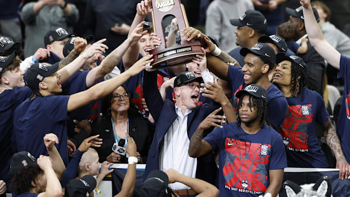 Mar 29, 2026; Washington, DC, USA; UConn Huskies head coach Dan Hurley hoists the east regional trophy after defeating the Duke Blue Devils in an Elite Eight game of the East Regional of the men's 2026 NCAA Tournament at Capital One Arena. Mandatory Credit: Amber Searls-Imagn Images Mar 29, 2026; Washington, DC, USA; UConn Huskies head coach Dan Hurley hoists the east regional trophy after defeating the Duke Blue Devils in an Elite Eight game of the East Regional of the men's 2026 NCAA Tournament at Capital One Arena. Mandatory Credit: Amber Searls-Imagn Images