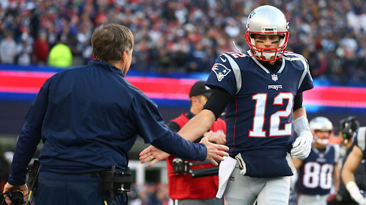 Jan 21, 2018; Foxborough, MA, USA; New England Patriots quarterback Tom Brady (12) celebrates a second quarter touchdown with head coach Bill Belichick against the Jacksonville Jaguars during the AFC Championship at Gillette Stadium. Mandatory Credit: Mark J. Rebilas-USA TODAY Sports