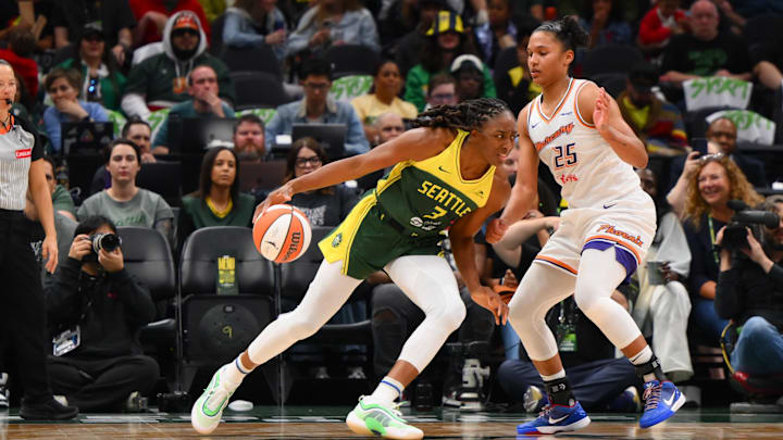 May 23, 2025; Seattle, Washington, USA; Seattle Storm forward Nneka Ogwumike (3) dribbles the ball towards the basket while defended by Phoenix Mercury forward Alyssa Thomas (25) during the second half at Climate Pledge Arena. Mandatory Credit: Steven Bisig-Imagn Images