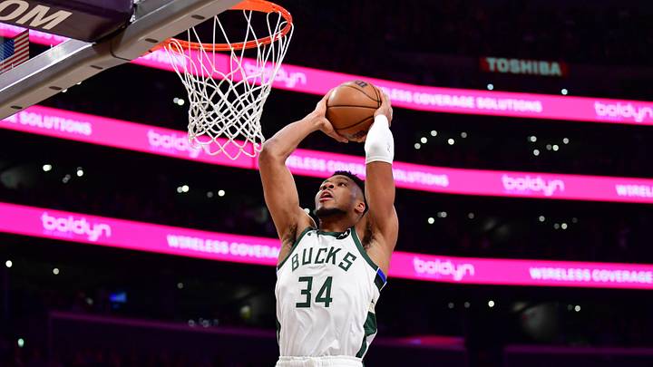 Jan 9, 2026; Los Angeles, California, USA; Milwaukee Bucks forward Giannis Antetokounmpo (34) dunks for the basket against the Los Angeles Lakers during the first half at Crypto.com Arena. Mandatory Credit: Gary A. Vasquez-Imagn Images