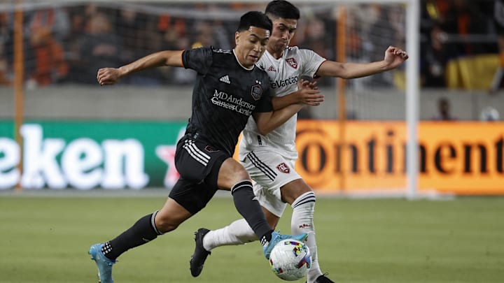 Feb 27, 2022; Houston, Texas, USA; Houston Dynamo FC midfielder Memo Rodriguez (8) and Real Salt