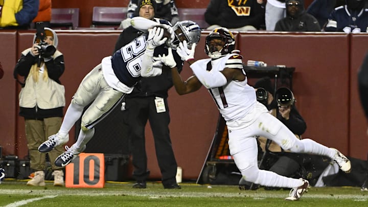 Dallas Cowboys cornerback DaRon Bland intercepts a pass intended for Washington Commanders wide receiver Terry McLaurin during the second half at FedEx Field. 