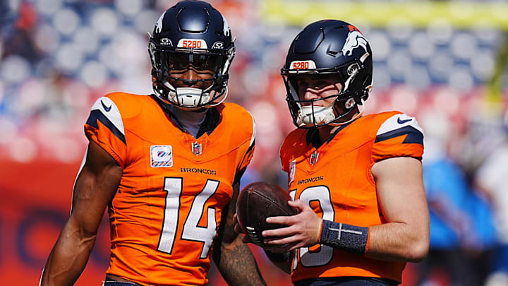 Oct 13, 2024; Denver, Colorado, USA; Denver Broncos wide receiver Courtland Sutton (14) and quarterback Bo Nix (10) warm up before the game against the Los Angeles Chargers at Empower Field at Mile High.