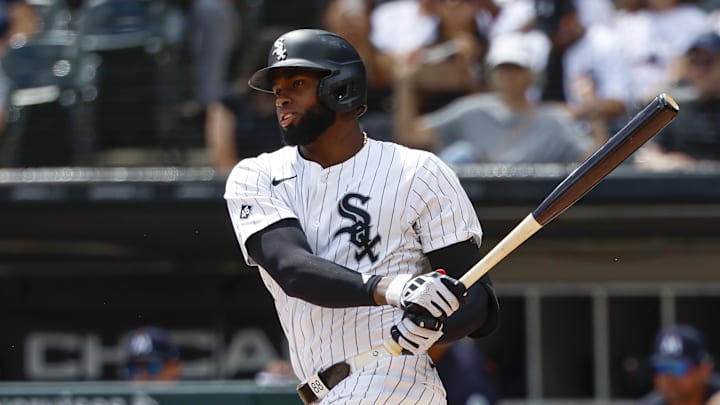 Chicago White Sox center fielder Luis Robert Jr. (88) singles against the Minnesota Twins during the first inning at Rate Field. Chicago White Sox center fielder Luis Robert Jr. (88) singles against the Minnesota Twins during the first inning at Rate Field.