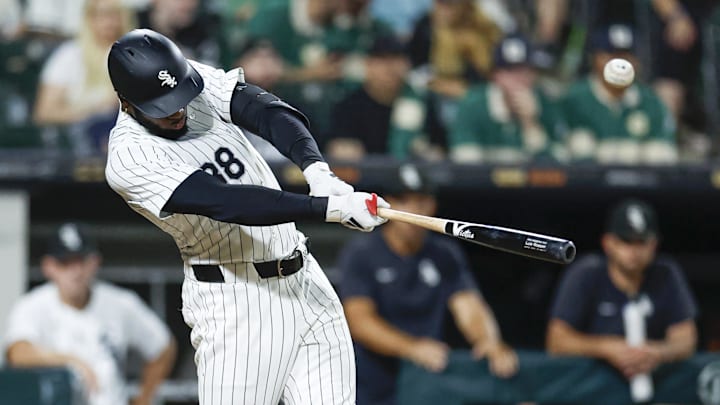 Sep 14, 2024; Chicago, Illinois, USA; Chicago White Sox outfielder Luis Robert Jr. (88) singles against the Oakland Athletics during the seventh inning at Guaranteed Rate Field. Mandatory Credit: Kamil Krzaczynski-Imagn Images