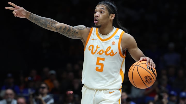 Mar 28, 2025; Indianapolis, IN, USA; Tennessee Volunteers guard Zakai Zeigler (5) dribbles the ball against the Kentucky Wildcats in the second half during a Midwest Regional semifinal of the 2025 NCAA tournament at Lucas Oil Stadium. Mandatory Credit: Trevor Ruszkowski-Imagn Images Mar 28, 2025; Indianapolis, IN, USA; Tennessee Volunteers guard Zakai Zeigler (5) dribbles the ball against the Kentucky Wildcats in the second half during a Midwest Regional semifinal of the 2025 NCAA tournament at Lucas Oil Stadium. Mandatory Credit: Trevor Ruszkowski-Imagn Images
