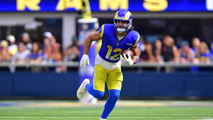 Sep 28, 2025; Inglewood, California, USA; Los Angeles Rams wide receiver Puka Nacua (12) runs the ball against the Indianapolis Colts during the second half at SoFi Stadium. Mandatory Credit: Gary A. Vasquez-Imagn Images
