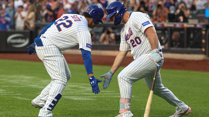 Jun 11, 2025; New York City, New York, USA; New York Mets right fielder Juan Soto (22) celebrates with first baseman Pete Alonso (20) after hitting a two run home run during the third inning against the Washington Nationals at Citi Field. Mandatory Credit: Vincent Carchietta-Imagn Images