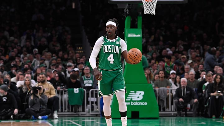 Apr 5, 2024; Boston, Massachusetts, USA; Boston Celtics guard Jrue Holiday (4) moves the ball against the Sacramento Kings during the first half at TD Garden. Mandatory Credit: Eric Canha-Imagn Images