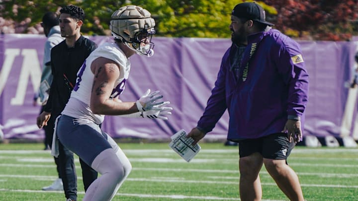 Ryan Otton and Jordan Paopao interact during spring ball in 2024. 
