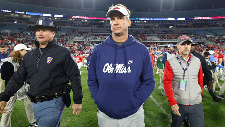 Jan 2, 2025; Jacksonville, FL, USA; Mississippi Rebels head coach Lane Kiffin celebrates after beating the Duke Blue Devils in the Gator Bowl at EverBank Stadium. Mandatory Credit: Nathan Ray Seebeck-Imagn Images