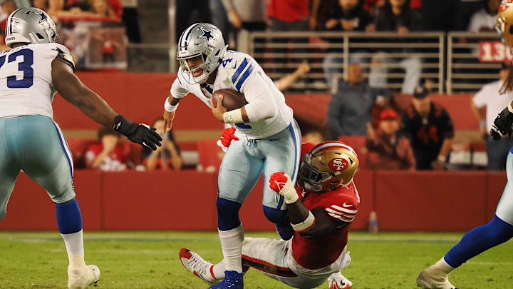 San Francisco 49ers defensive lineman Sam Okuayinonu (91) sacks Dallas Cowboys quarterback Dak Prescott (4) during the fourth quarter at Levi's Stadium.