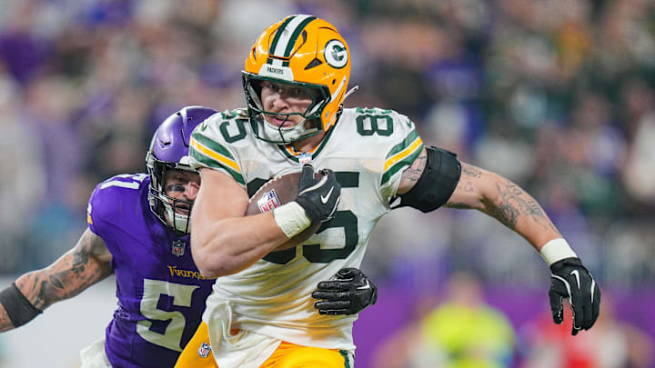 Green Bay Packers tight end Tucker Kraft (85) runs after the catch against Minnesota Vikings in the fourthn quarter at U.S. Bank Stadium. 