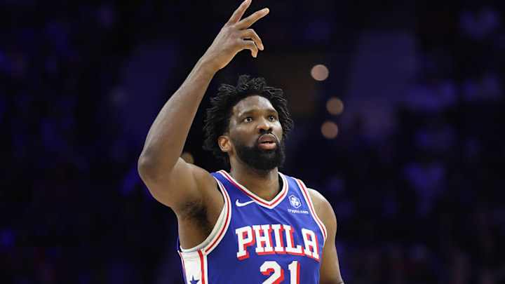 Jan 7, 2026; Philadelphia, Pennsylvania, USA; Philadelphia 76ers center Joel Embiid (21) reacts to his three pointer against the Washington Wizards during the second quarter at Xfinity Mobile Arena. Mandatory Credit: Bill Streicher-Imagn Images